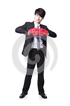 Successful businessman with boxing gloves