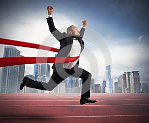 Successful businessman in a finishing line
