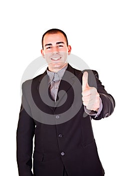 Successful businessman holding thumb up