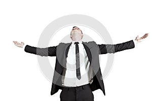 Successful businessman with outstretched arms photo