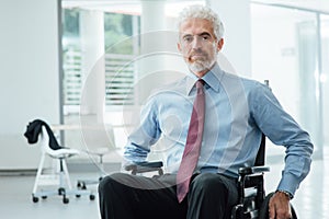 Successful businessman overcoming disability photo