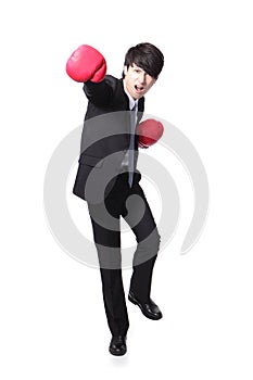 Successful businessman punching and hitting