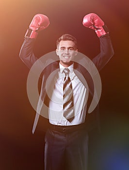 Successful businessman in red Boxing gloves