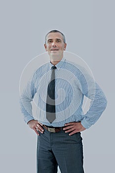 Successful businessman in shirt and tie holding his hands at his