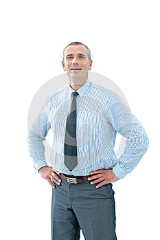 Successful businessman in shirt and tie holding his hands at his