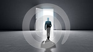 Successful businessman walking in front of bright success door in concrete interior with shadow on floor. Future concept