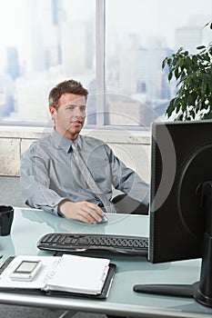 Successful businessman working at desk