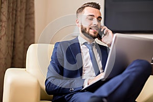 Successful Businessman Working with Laptop
