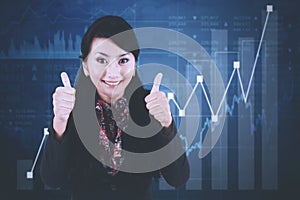 Successful businesswoman with growth graph