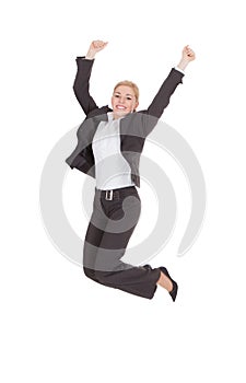 Successful businesswoman jumping against white background