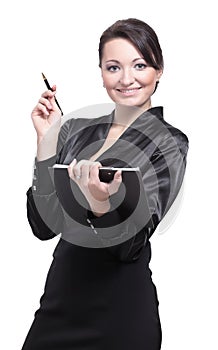 Successful businesswoman making notes posing against white