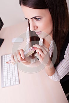 Successful businesswomen. Confident woman sitting at her workin