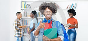 Successful cheering afro american male college student