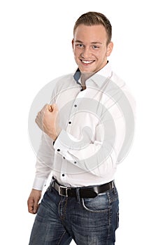 Successful cheering isolated young blond man making fist gesture