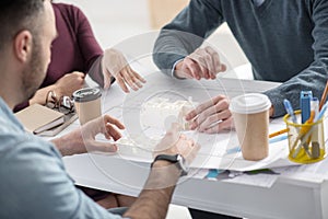 Successful colleagues working at the table