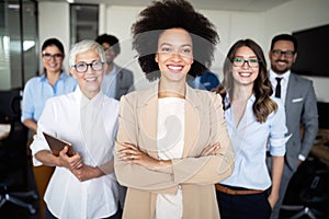 Successful company with happy workers in office