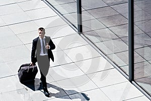 Successful Corporate Man With Luggage