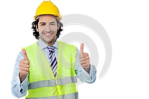 Successful engineer showing thumbs up