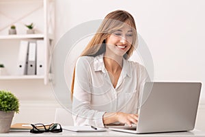 Successful Entrepreneur Woman Using Laptop In Modern Office