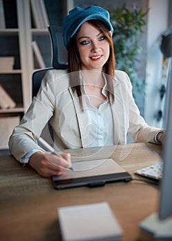 Successful female is devoted to her career and working late on c