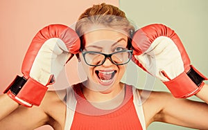 Successful female. Smart strong and sexy. Super woman concept. Successful womanhood. Woman boxing gloves adjust