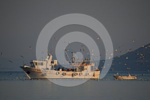 Fishing boat full of catches