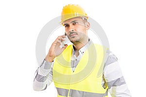 Successful foreman or construction worker talking on the phone