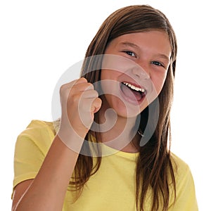 Successful girl clenching fist when winning photo