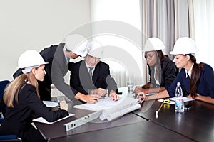 Successful group of architects discussing