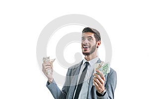 Successful and happy business man with money in his hands