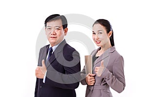 successful, happy, confident business people giving thumb up gesture to you