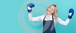 successful happy woman in cook apron and boxing gloves, housewife. Woman isolated face portrait, banner with mock up