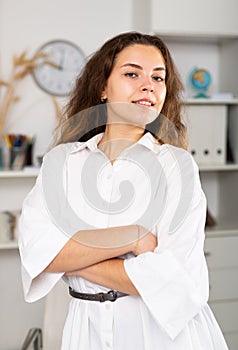 Successful happy young business woman in office