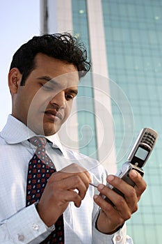 Successful Indian business man on phone