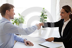 Successful job interview with boss and employee handshaking