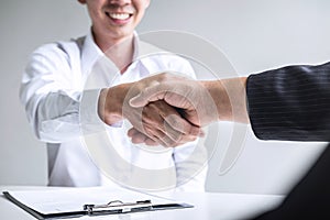 Successful job interview, Boss employer in suit and new employee shaking hands after negotiation and interview, career and