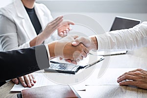 Successful job interview, Image of Boss employer committee or recruiter in suit and new employee shaking hands and clap after good