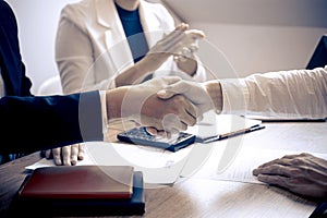 Successful job interview, Image of Boss employer committee or recruiter in suit and new employee shaking hands and clap after good