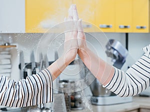 Successful job kitchen women high five flour