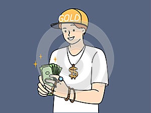 Successful male rapper with dollars in hands