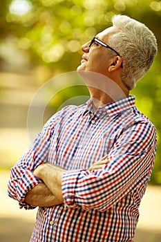 Successful man concept. Portrait of a smiling happy mature old