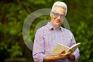 Successful man concept. Portrait of a smiling happy mature old