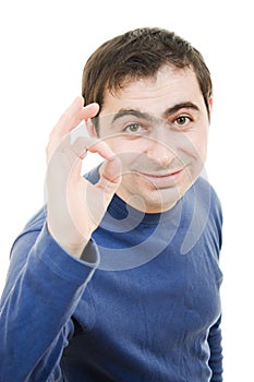 A successful man shows gesture okay