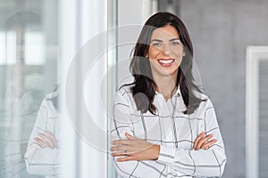 Successful mature business woman looking at camera