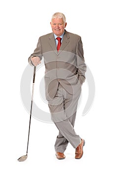 Successful mature businessman with golf club