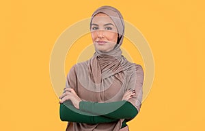 Successful Modern Muslim Woman In Hijab Posing Standing In Studio