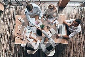 Successful professionals. Top view of young modern men in smart