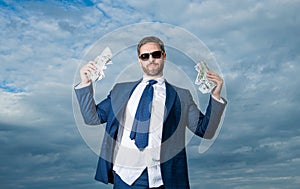 successful riches of man with money outdoor. riches of man with money in suit.