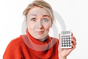 Successful savings for funny young blond woman with calculator