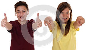 Successful smiling children showing thumbs up